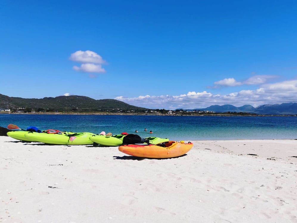 sea kayaking - kayaks in the sand