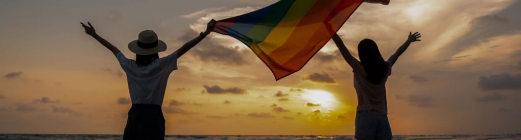 LGBTQA+ trips and lessons - women and flag