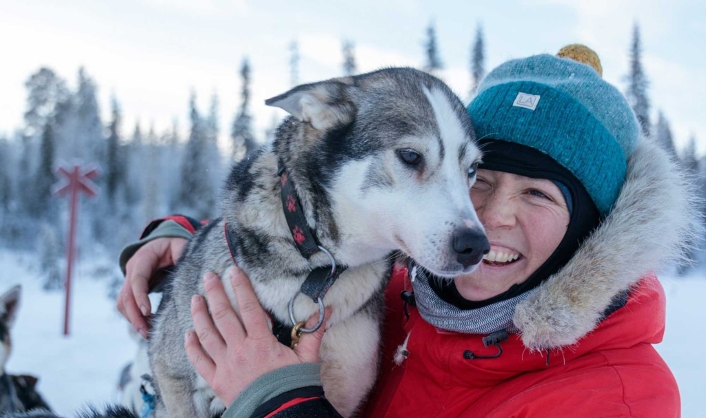 woman and husky - who we are - move with nature