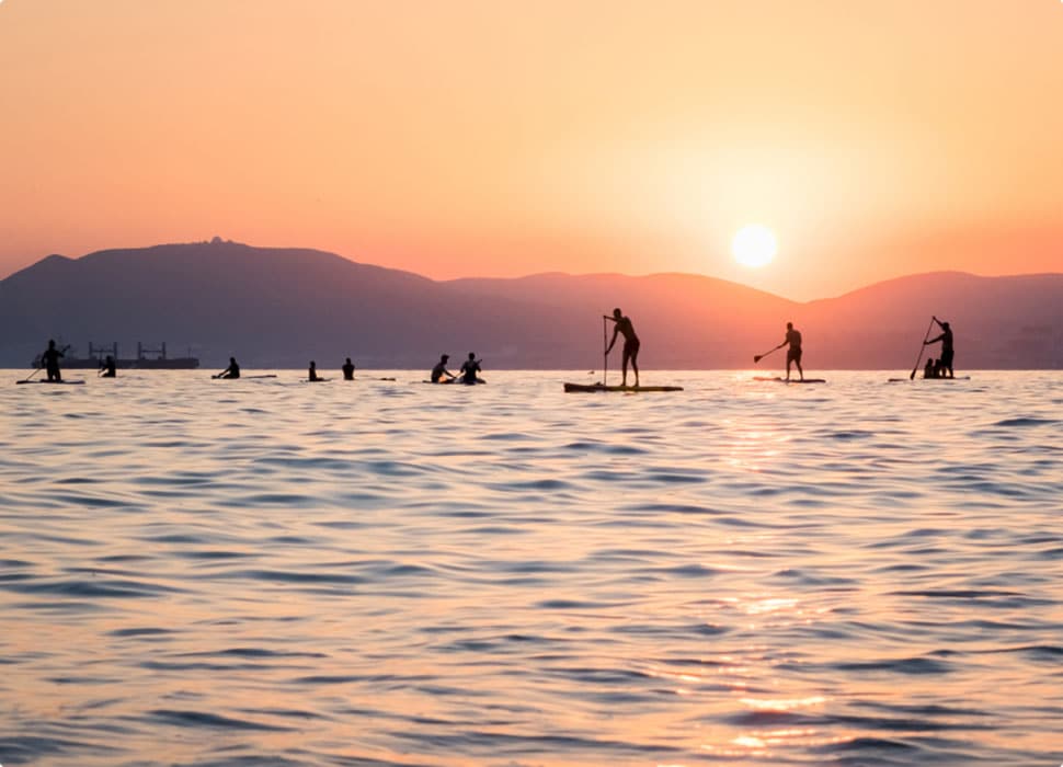 women-only group stand-up paddleboarding